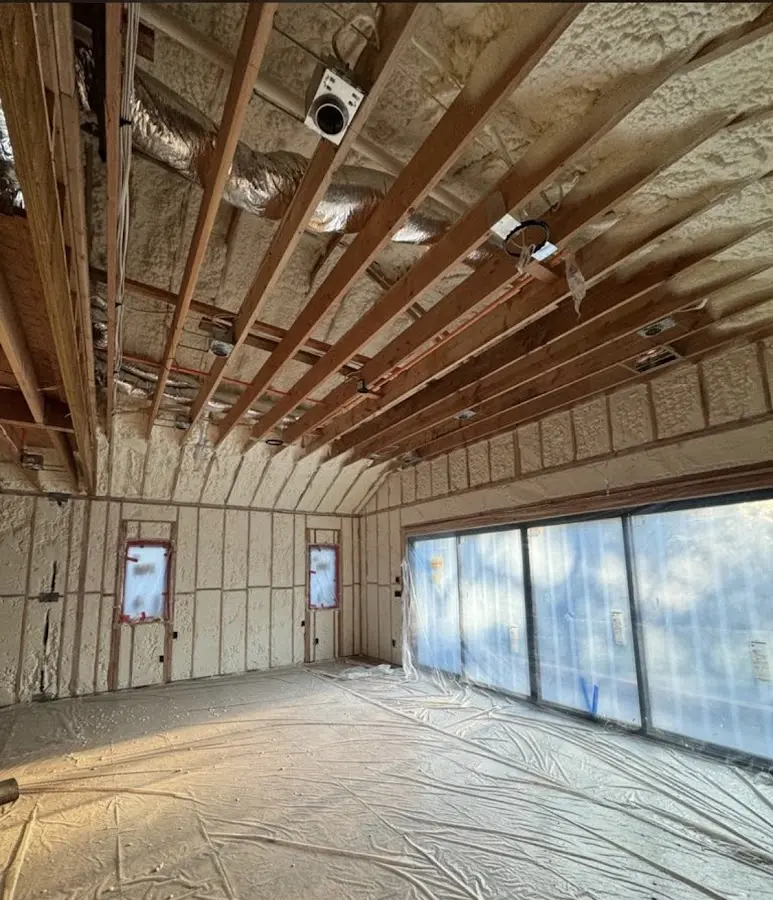 Interior walls and ceiling insulated with spray foam during new construction in Huntingdon
